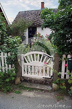 Garden cottage with gate Stock Photo