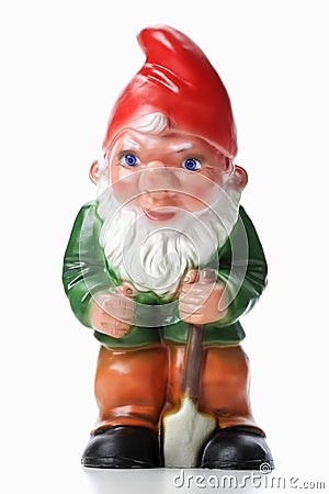 Garden Gnome holding spade Stock Photo