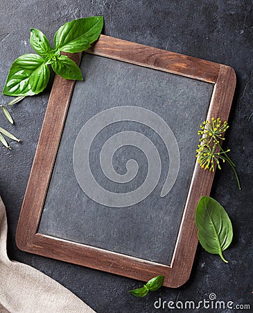 Garden herbs and blackboard Stock Photo