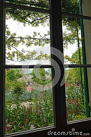 Garden from the inside of Monets house in Giverny Stock Photo