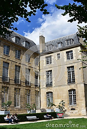 Garden in parisian style mansion known as hotel particulier. Hotel de Lamoignon townhouse. Paris, France. Editorial Stock Photo