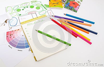 Garden planning for spring and notebook with colored pencils. Landscape design Stock Photo