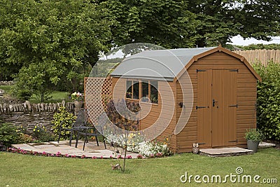 A garden shed and small patio Stock Photo