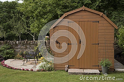 A garden shed and small patio Stock Photo