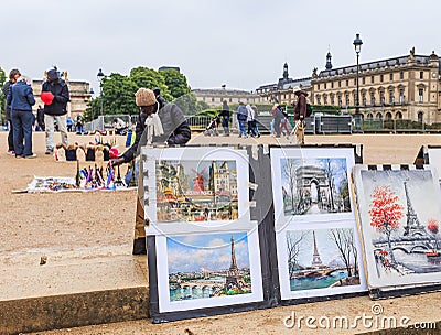 In the garden of the Tuileries, Paris, tourists buy souvenirs Editorial Stock Photo