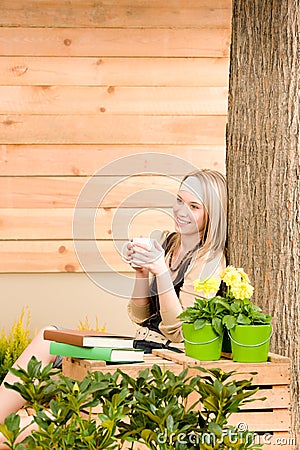 Garden woman terrace enjoy rest cup coffee Stock Photo