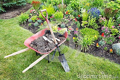 Garden work being done landscaping a flowerbed Stock Photo