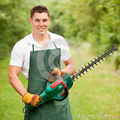 Gardener with hedge trimmer Stock Photo