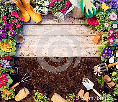 Gardening Frame - Tools And Flowerpots On Wooden Table Stock Photo
