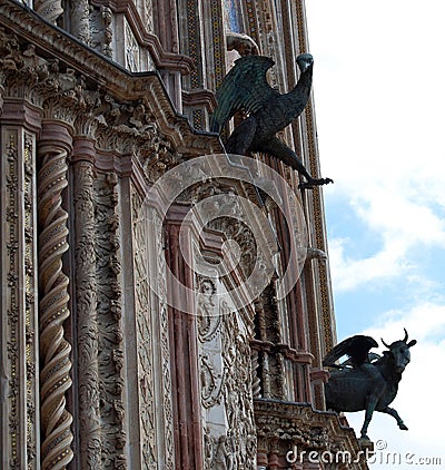 Gargoyle on the facade of the Cathedral of Orvieto. Italy Stock Photo