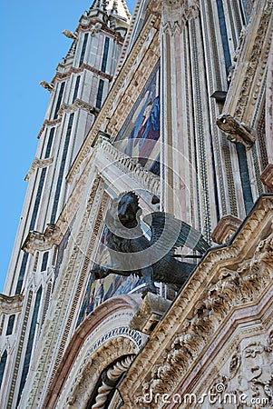 Gargoyle on the facade of the Cathedral of Orvieto. Italy Stock Photo