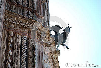 Gargoyle on the facade of the Cathedral of Orvieto. Italy Stock Photo