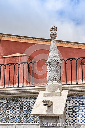 The gargoyle turret with a cross in the Pena National Palace in Sintra town, Portugal Stock Photo