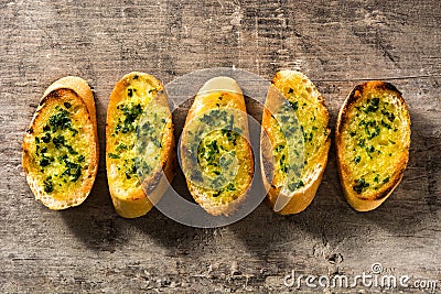 Garlic breads slice on wooden table. Stock Photo