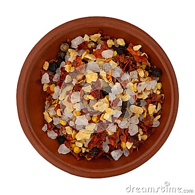 Garlic and chili seasoning in a small clay bowl top view Stock Photo