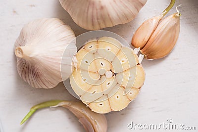 Garlic Cloves and Bulb for food cooking in the kitchen Stock Photo