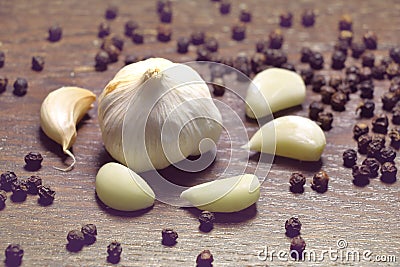 Garlic. fresh garlic. cloves of garlic and black pepper. Stock Photo