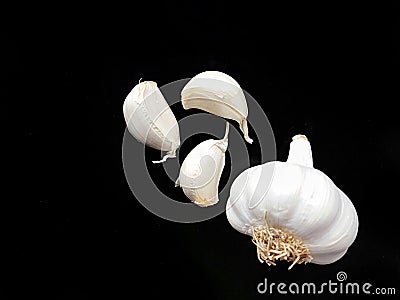 Garlic isolated on black background Stock Photo