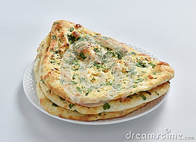 Garlic Nan, A delicious Indian flat bread baked in clay oven Stock Photo