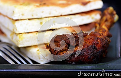 Garlic nan with grilled chiken Stock Photo