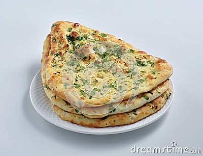 Garlic Nan, A delicious Indian flat bread baked in clay oven Stock Photo