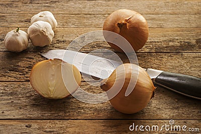 Garlic onion wood knife Stock Photo