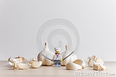 Garlic peeling process. Cooking concept. Illustrative editorial. July 01, 2023 Editorial Stock Photo