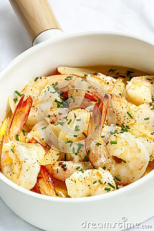 Garlic Prawns or Shrimp in White Serving Pan Stock Photo