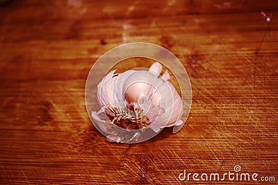 Garlic on a wooden board Stock Photo