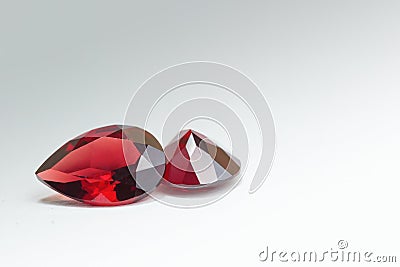 Garnet gem stone in grey background Stock Photo