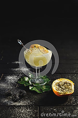 Garnished cocktail on black background Stock Photo