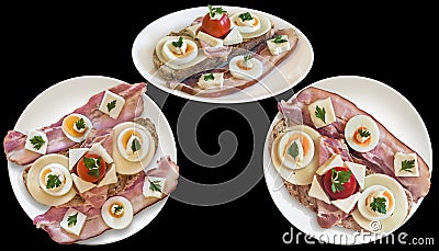 Garnished Gourmet Bacon Cheese Egg Ham and Tomato Sandwiches on White Porcelain Plates on Black Background Stock Photo