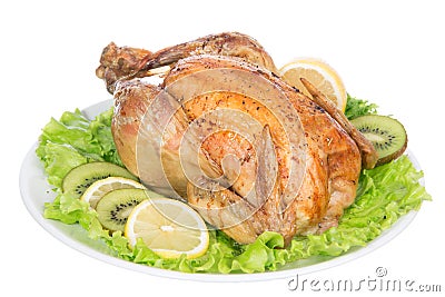 Garnished roasted thanksgiving chicken on a plate decorated with Stock Photo