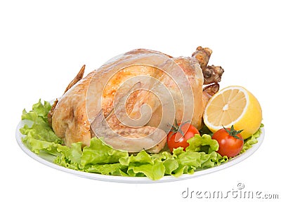 Garnished roasted thanksgiving chicken on a plate Stock Photo