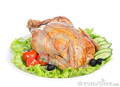 Garnished roasted thanksgiving chicken on a plate Stock Photo