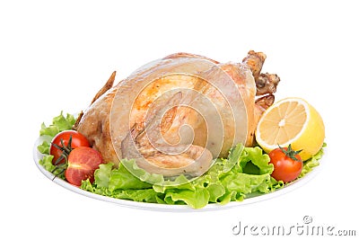 Garnished roasted thanksgiving chicken on a plate Stock Photo