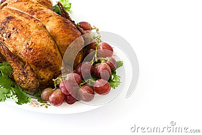 Garnished roasted turkey with grapes and herbs Stock Photo