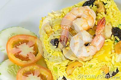 Garnished Yellow Fried Rice with shrimps Stock Photo