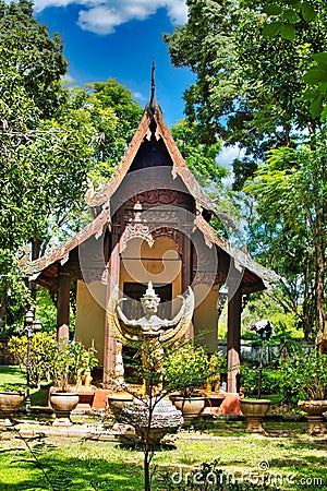 Ubosot and Garuda statue on a Thai temple complex Stock Photo