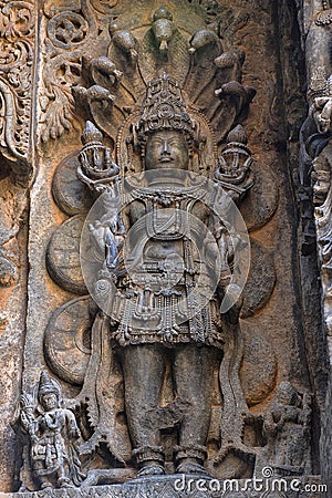 Garuda, Vishnu & Lakshmi. Hoysalesvara Temple, Halebid, Karnataka Stock Photo