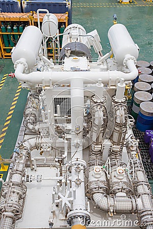 Gas booster compressor reciprocating type at offshore oil and gas platform. Stock Photo