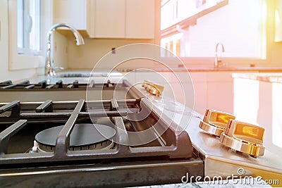 Gas Cooker Installation Gas Appliance Repair new house gas stove close up Stock Photo