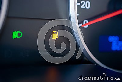 Gas gauge fuel empty. Petrol tank meter car indicator on dashboard. Low gasoline level. Fuel gauge gas. Stock Photo