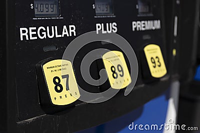Gas pump dispenser with three qualities of gasoline Stock Photo