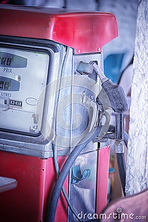 Gas pump nozzles in the retro service station, vintage effect Stock Photo