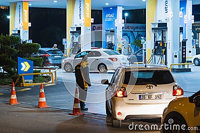 Gas quee of vehicles at the gas station before the big raise of the prices. Izmir Bayrakli Turkey Editorial Stock Photo