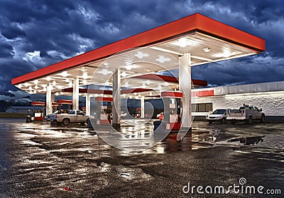 Gas station on rainy night Stock Photo