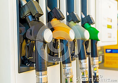 Gas station with four multi-colored handles close-up Stock Photo