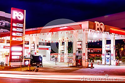 Gas Station At Night Editorial Stock Photo