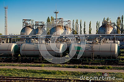 Gas storage sphere tanks and train tanks in petrochemical factory Stock Photo